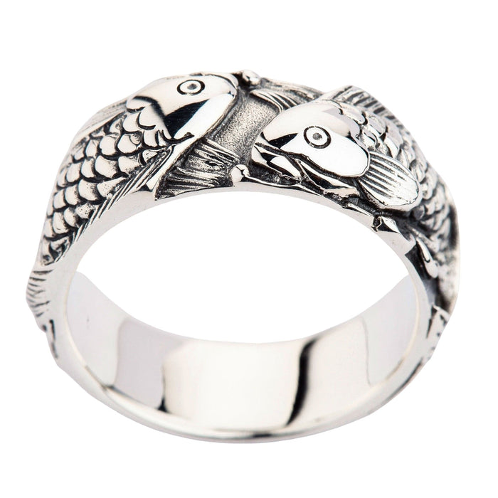 A detailed view focusing on the two koi fish meeting, symbolizing love, harmony, and yin-yang.