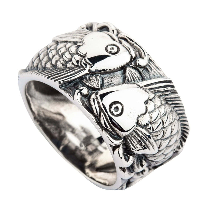 Close-up of sterling silver koi fish ring with detailed scales and fins.