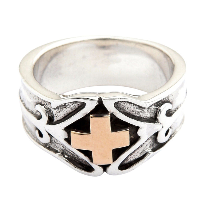 The two-tone Christian warrior ring with a polished silver band and a central gold cross, viewed from top.
