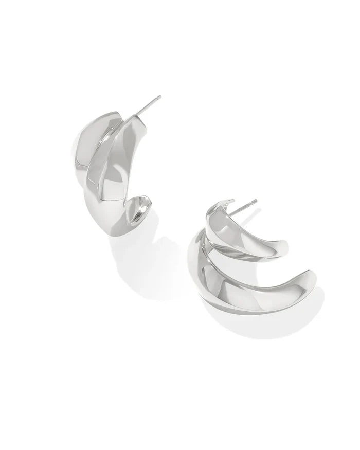 A pair of silver-colored double hoop earrings with a rhodium over brass closure.