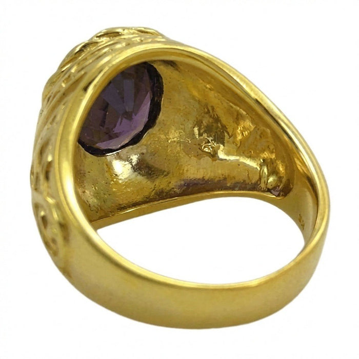 Interior perspective displaying the exposed back of the natural amethyst and the inner gold ring shank.