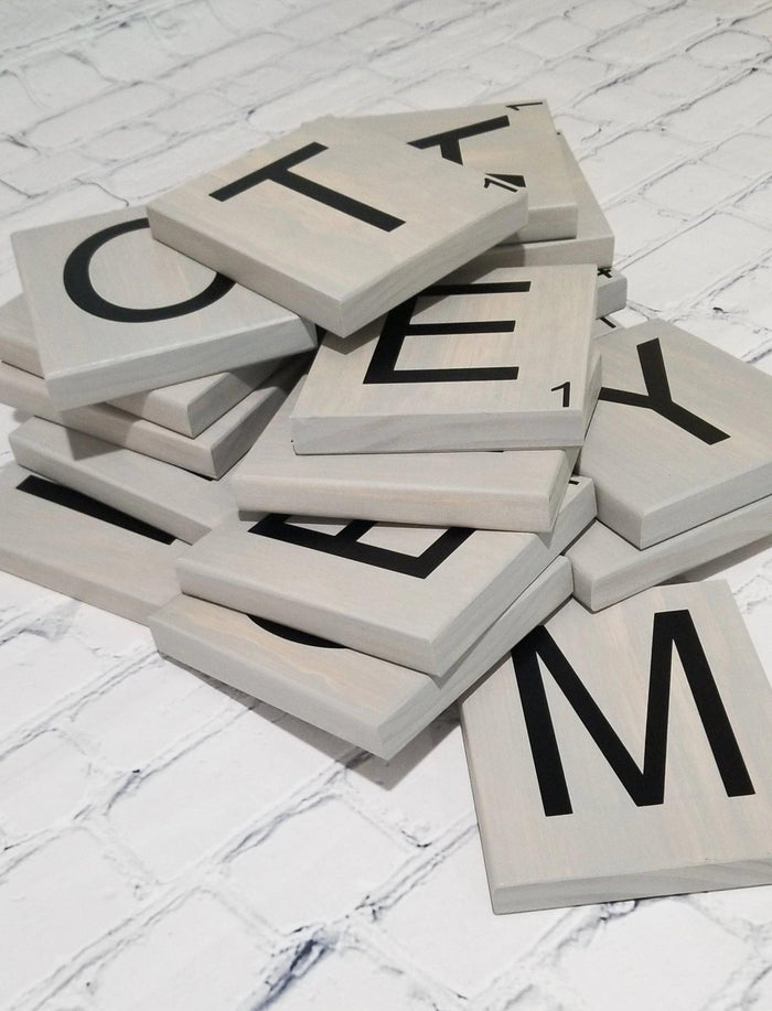 Rustic home décor featuring large wood Scrabble tiles.
