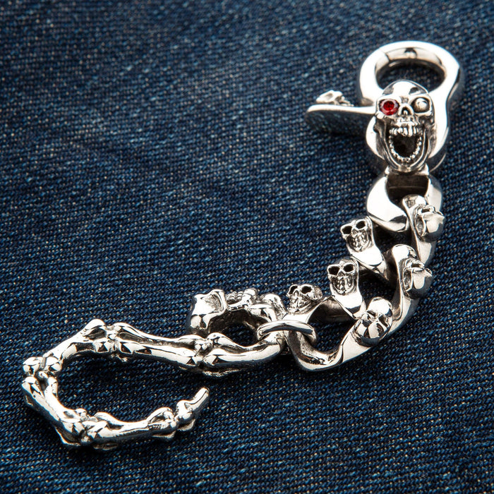Close up of the skeletal bone hook design on the silver biker keychain.