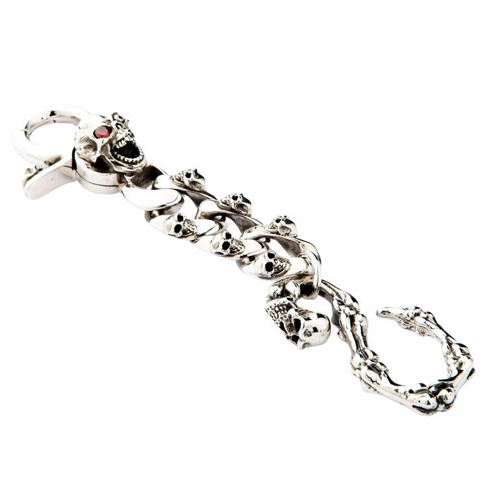 Full view of sterling silver skull keychain featuring a large mad skull with a red garnet eye.