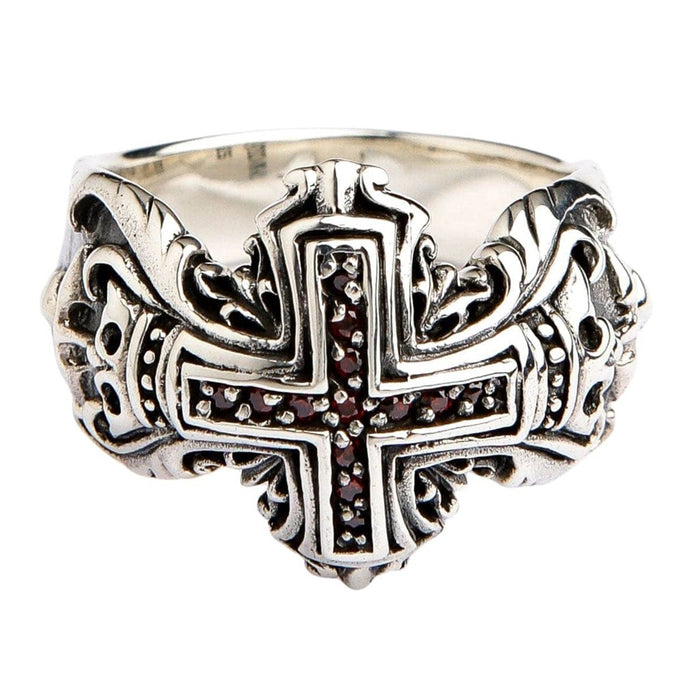 Sterling silver medieval cross ring with red garnet inlays front view showing intricate scrollwork design