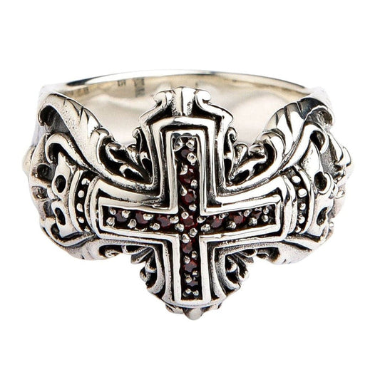 Sterling silver medieval cross ring with red garnet inlays front view showing intricate scrollwork design