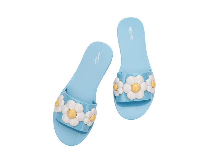 Melissa Babe AD Spring Light Blue Flat Slip-On Slides for Women – Chic and comfortable light blue flat slides, ideal for casual outings and relaxed style.