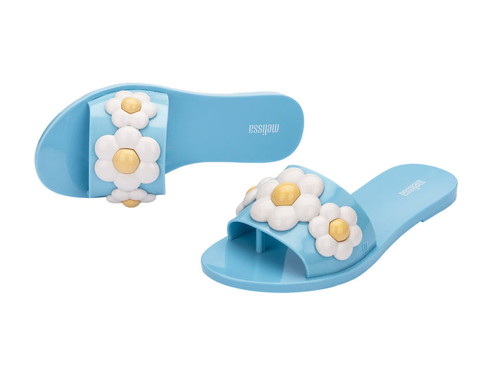 Melissa Babe AD Spring Light Blue Flat Slip-On Slides for Women – Chic and comfortable light blue flat slides, ideal for casual outings and relaxed style.