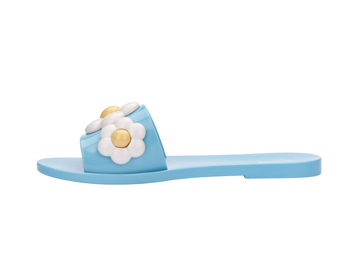 Melissa Babe AD Spring Light Blue Flat Slip-On Slides for Women – Chic and comfortable light blue flat slides, ideal for casual outings and relaxed style.