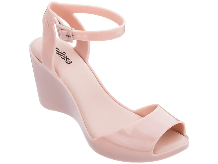 Melissa Blanca Ankle Strap Peep Toe Wedges Heel Light Pink Sandal for Women – Stylish and comfortable wedge sandals with an elegant ankle strap and peep-toe design. Perfect for casual and dressy occasions.