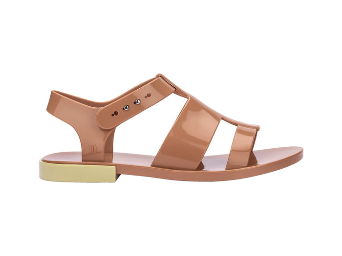 Melissa Blend Flat Strappy Brown Sandal styled for casual summer looks, offering comfort and sophistication in brown