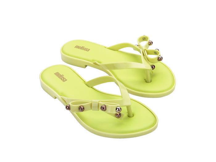 Melissa Flip Flop Slim II Bow Detail Yellow Beachwear Slipper for Women â€“ Trendy and comfortable slim flip-flops with a stylish bow design, perfect for beach outings and casual wear.