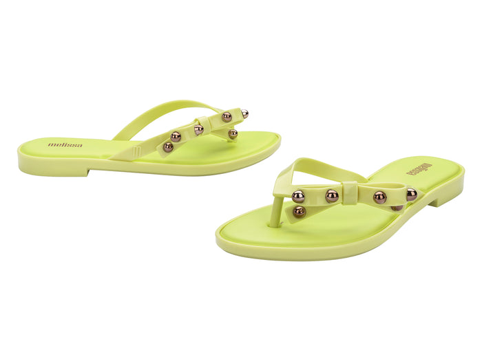 Melissa Flip Flop Slim II Bow Detail Yellow Beachwear Slipper for Women â€“ Trendy and comfortable slim flip-flops with a stylish bow design, perfect for beach outings and casual wear.