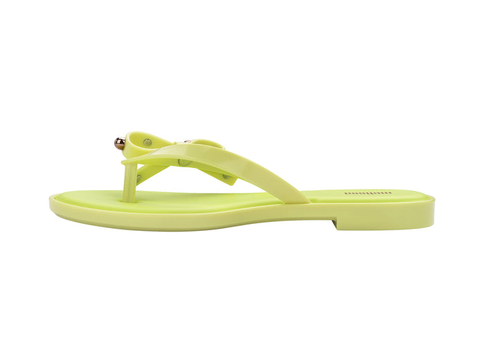 Melissa Flip Flop Slim II Bow Detail Yellow Beachwear Slipper for Women â€“ Trendy and comfortable slim flip-flops with a stylish bow design, perfect for beach outings and casual wear.
