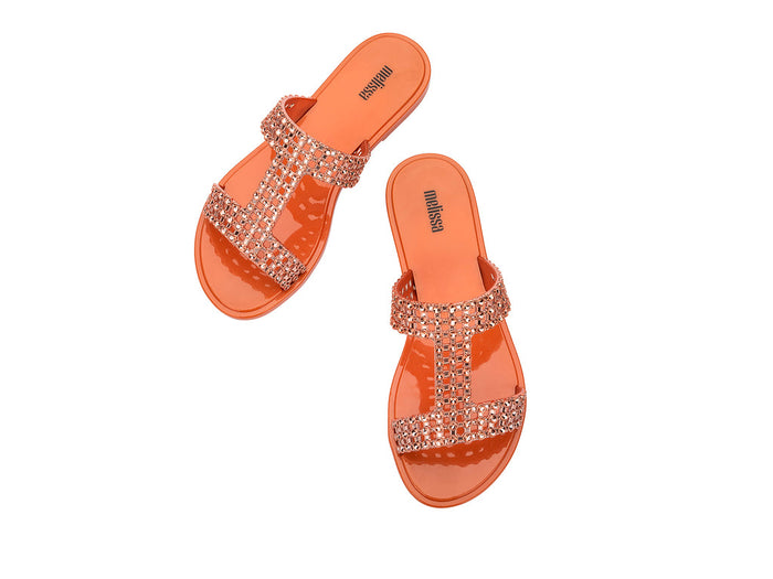Melissa Glowing Orange Slide Slip-ons for Women - Stylish and Comfortable Footwear