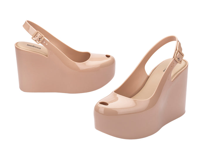 Melissa Groovy Beige Platform Wedge Sandal for Women with buckle strap and comfortable elevated heel design