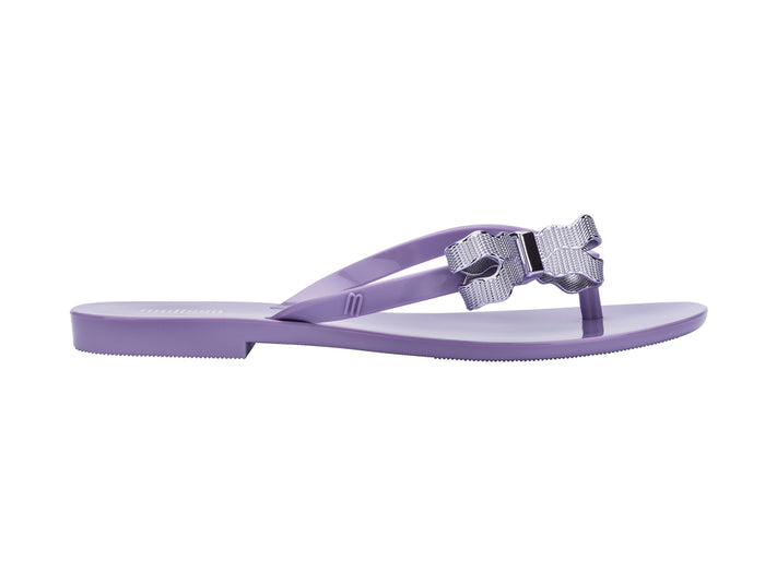 Melissa Harmonic Sweet V Flat Flip Flops Lilac Slippers for Women â€“ Stylish and comfortable flat flip-flops with a chic bow detail, perfect for casual and everyday wear.