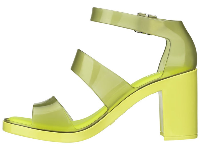 Melissa Model Block Heel Strappy Yellow Sandal, focusing on the flexible Mel-Flex material and block heel.