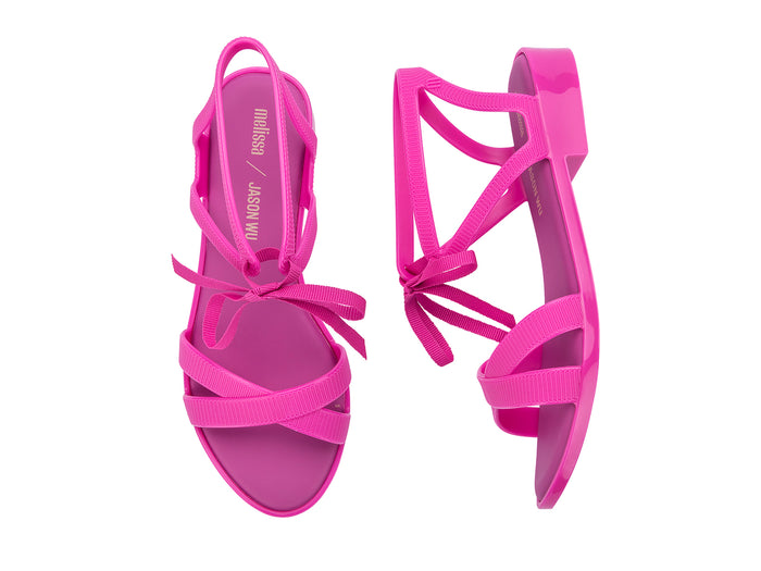 Melissa Ophelia Low X Jason Wu AD Strappy Fuchsia Sandal for Women â€“ Trendy and vibrant low-heel sandal with a strappy design, ideal for adding a pop of color to any outfit.
