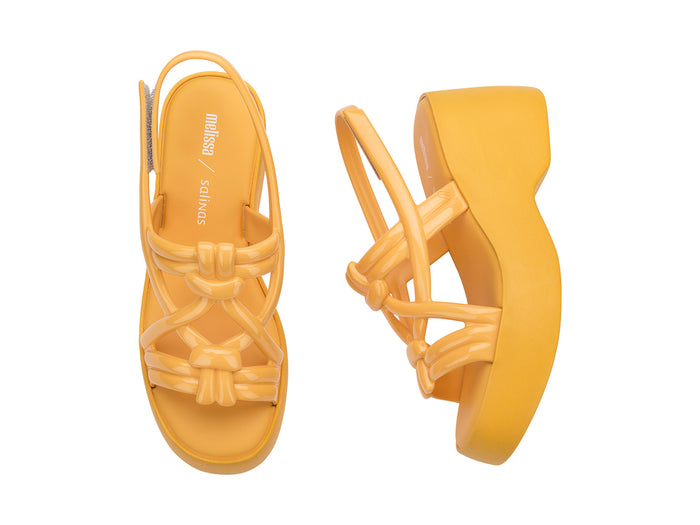 Melissa Sand Salinas Strappy Platform Heel Yellow Sandal for Women – Stylish and comfortable platform sandals with a chic strappy design, perfect for casual and dressy occasions.