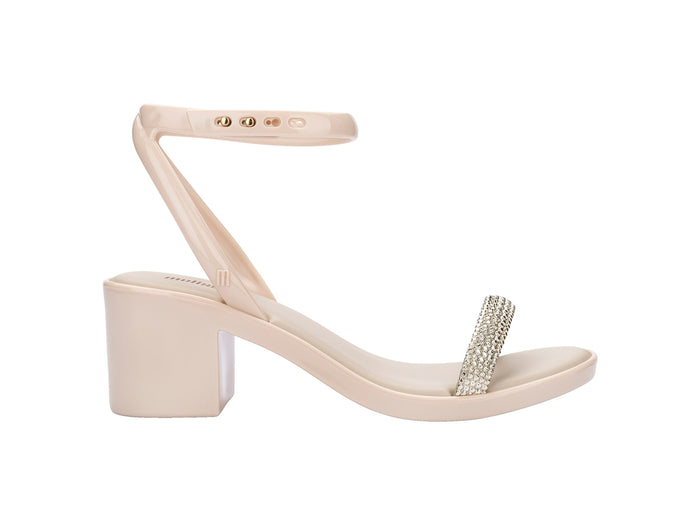 Melissa Shiny Block Heel Strappy Beige Sandal for Women – Stylish beige block heel sandals with elegant straps, perfect for party and casual wear.