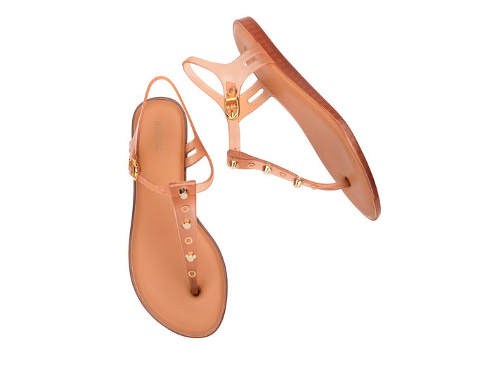 Melissa Solar Studs beige flip flop flat sandals for women with stylish stud detailing and comfortable everyday wear
