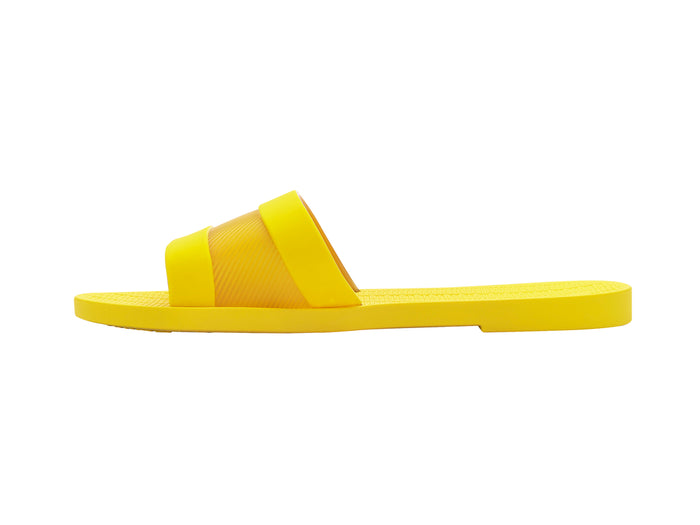 Melissa Sun Gaspea Ou Tiras yellow slides for women – trendy slip-on vegan sandals in bright summer style, crafted from Melflex for comfort and durability.