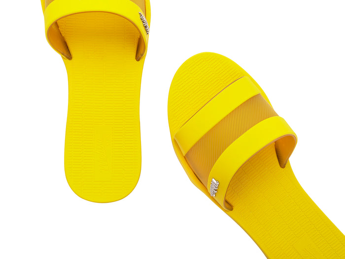 Melissa Sun Gaspea Ou Tiras yellow slides for women – trendy slip-on vegan sandals in bright summer style, crafted from Melflex for comfort and durability.