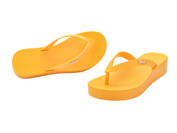 Melissa Sun Venice AD Yellow Platform Flipflop Slippers for Women - Comfortable and stylish footwear for casual outings.