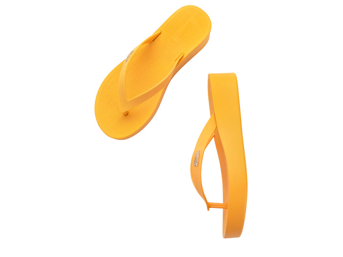 Melissa Sun Venice AD Yellow Platform Flipflop Slippers for Women - Comfortable and stylish footwear for casual outings.