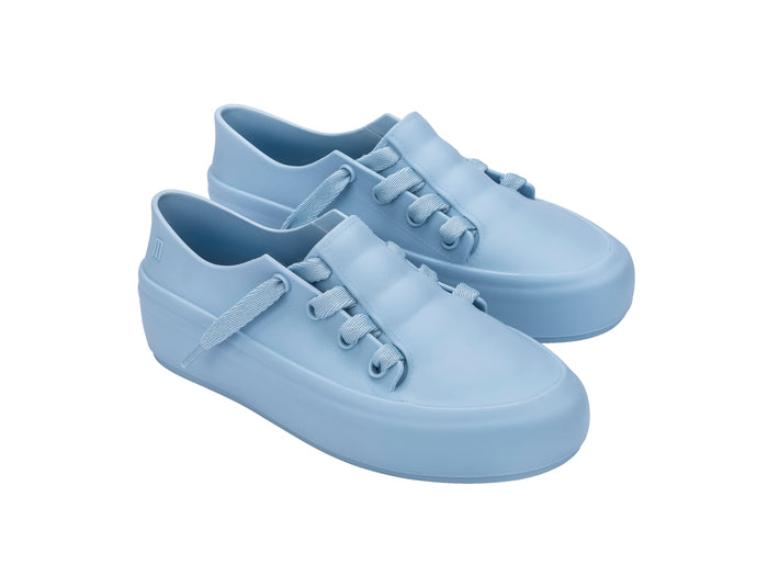 Melissa Ulitsa casual wear blue unisex sneaker featuring a sleek, comfortable design suitable for everyday wear by both men and women.