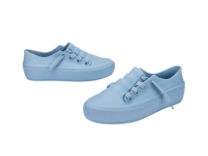 Melissa Ulitsa casual wear blue unisex sneaker featuring a sleek, comfortable design suitable for everyday wear by both men and women.