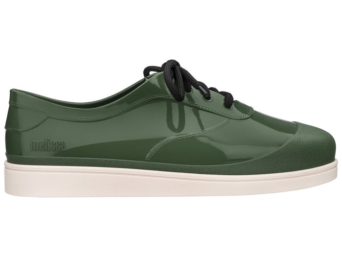 Unisex Melissa Line solid green lace-up sneakers featuring a sleek design and comfortable fit for both men and women