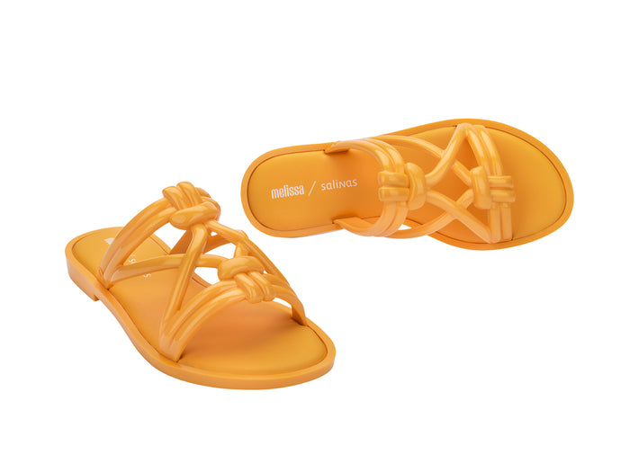 Melissa Wave Sand Salinas strappy yellow slip-on slides for women featuring a bold design, comfortable fit, and perfect for stylish beachwear.