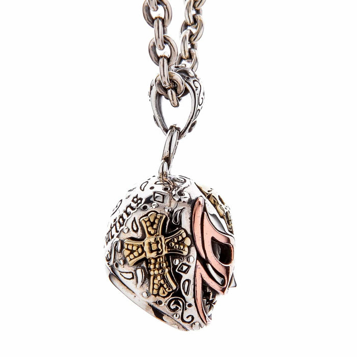A side profile of the men's biker mask pendant, showing its three-dimensional depth.