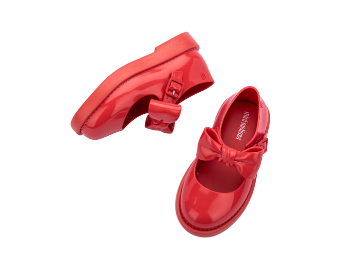 Mini Melissa Lola Baby Red Sneaker with Bow Applique – stylish, comfy, and durable baby sneakers for girls. Perfect toddler footwear with COD available.