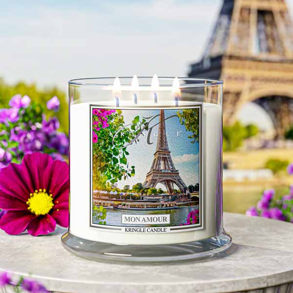 Kringle Candle with Eiffel Tower design in front of the Eiffel Tower