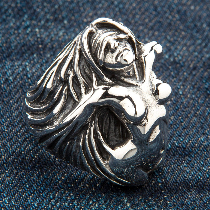A powerful biker ring featuring a nude goddess figure with intricate, flowing hair that forms the band.