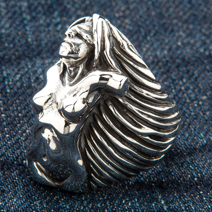 A handcrafted artistic ring made from solid sterling silver, depicting the beautiful female form in a gothic style.