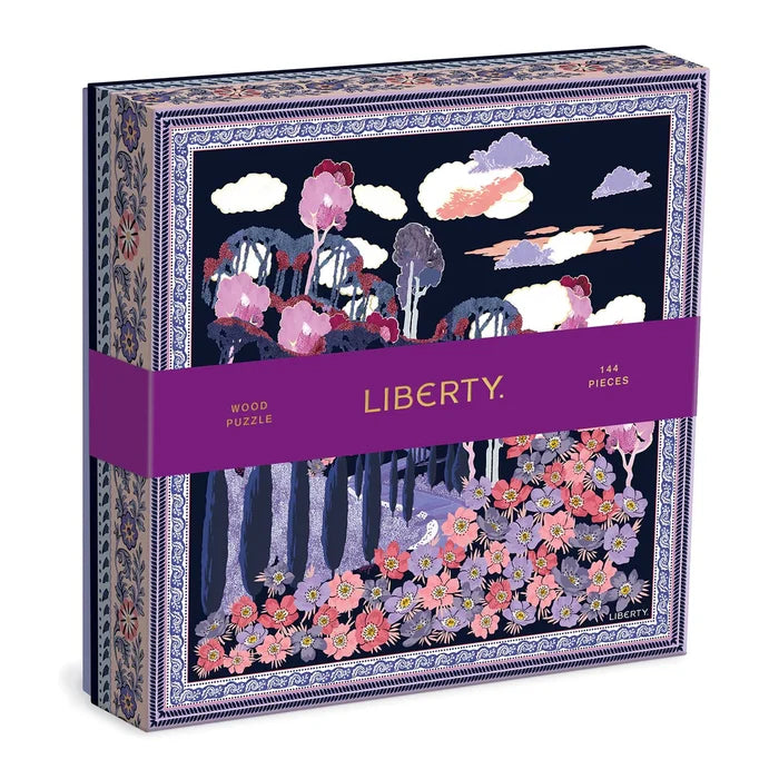 A puzzle box with a floral pattern design, labeled 'Liberty' and '144 Pieces', indicating it is a wooden puzzle box from the brand Liberty.
