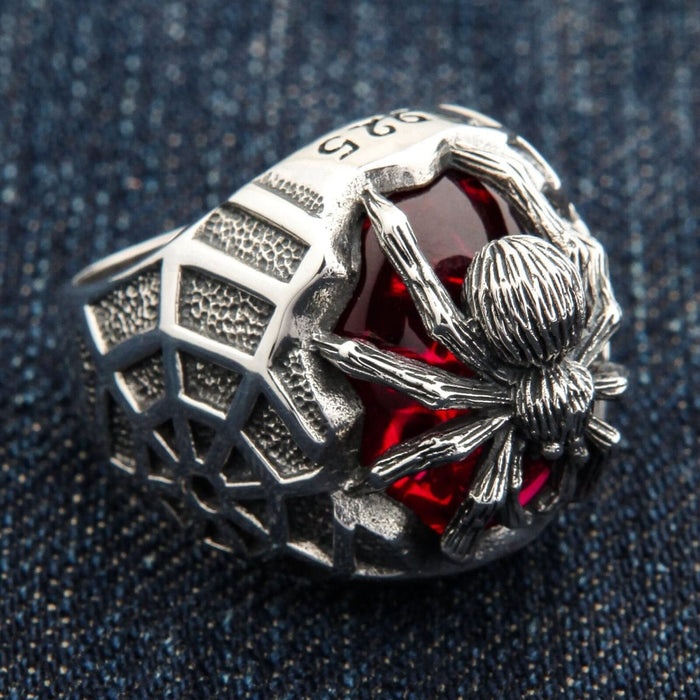 An alternative angle of the men's statement spider jewelry, highlighting the openwork design.
