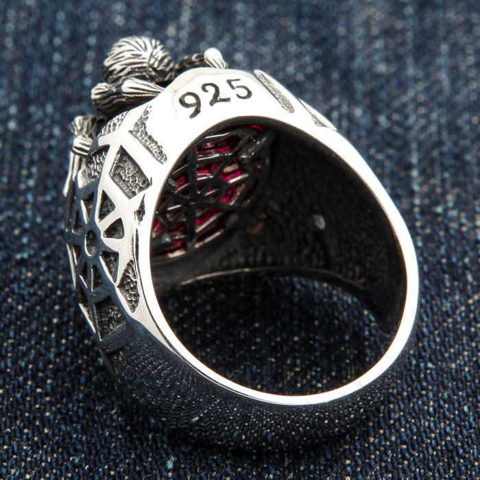The inside of the heavy spider web ring, showing its solid silver construction and 925 stamp.