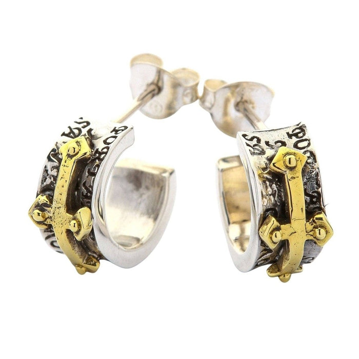 Pair of two-tone sterling silver and gold cross earrings showing gothic engravings and budded cross detail