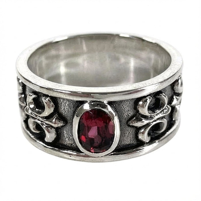 Sterling silver ruby men's band ring with fleur de lis design front view
