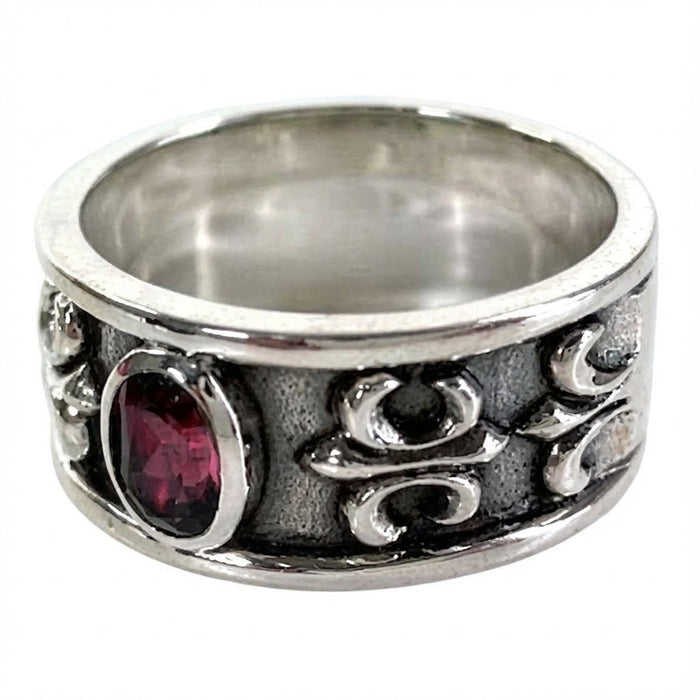 Gothic men's ruby ring with fleur de lis accents side profile view