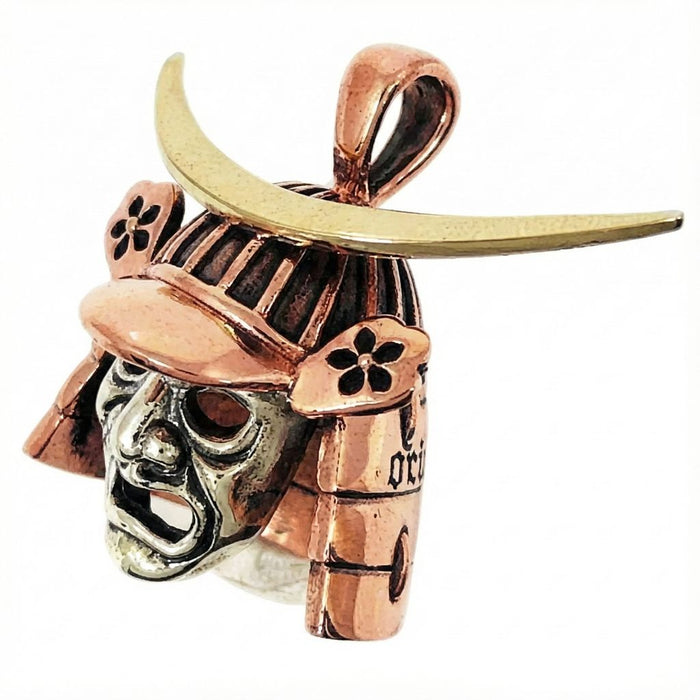 Side profile of Samurai Helmet Pendant showing copper and silver details