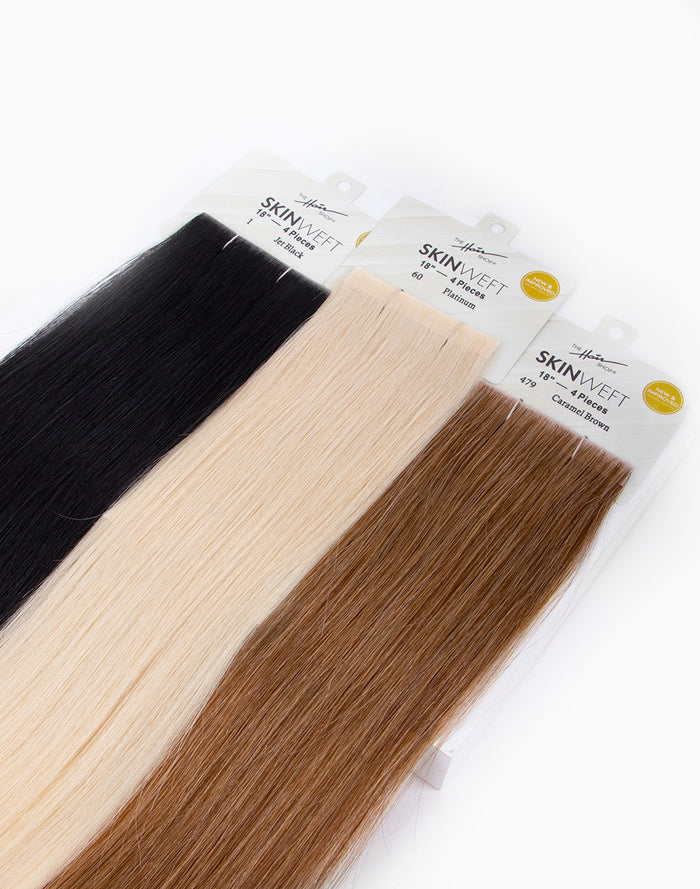 rows of skinweft tape in extentions with a variety of colors