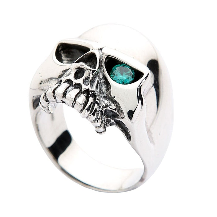 Heavy 925 sterling silver skull ring with blue gemstone left side profile