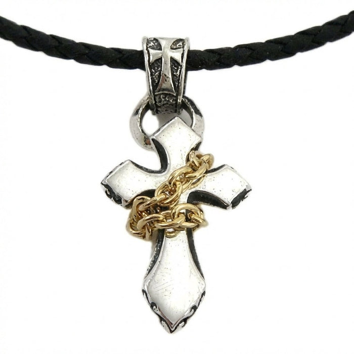 Rocker style sterling silver cross necklace with gold chain accent centered view on leather cord