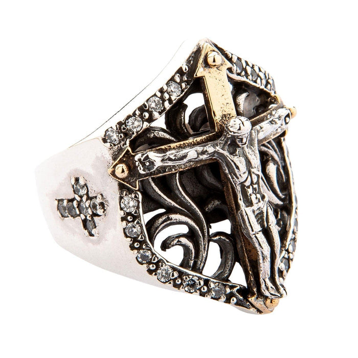 A men's sterling silver crucifix ring with a gold-plated cross and a shield-shaped border of CZ stones.